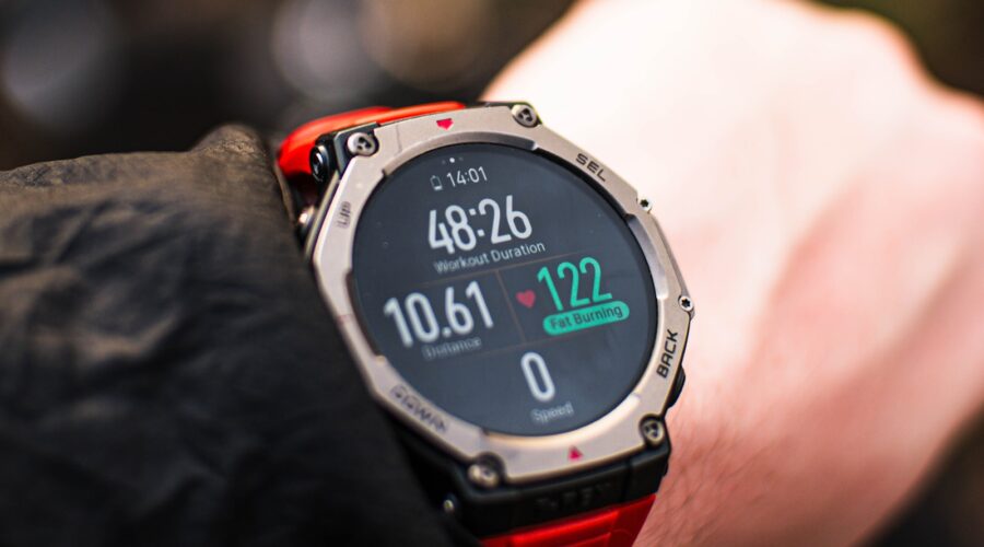 Person checking a fitness tracker during a workout