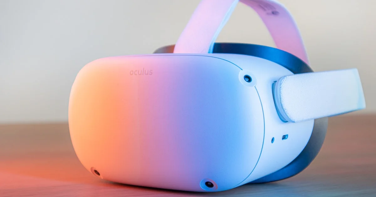 A white standalone VR headset resting on a desk, a common best budget VR headset for beginners