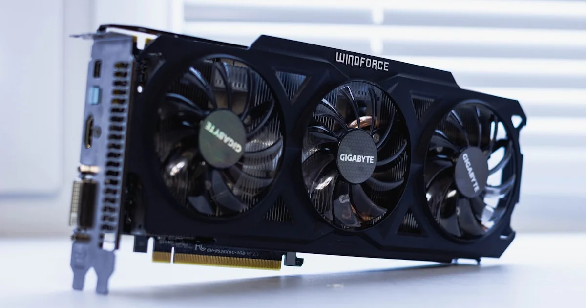 A multi-fan graphics card on a white surface, the kind of budget gpu under $300 for 1080p gaming
